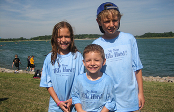 Janet's kids cheer on the mom who tris hard...